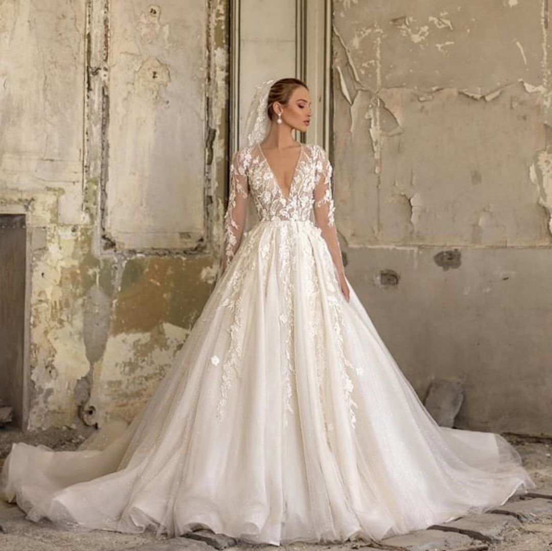 Elegant Deep V-neck Wedding Dress with Appliques, Lace, Ruffles, and Tulle-BallBride